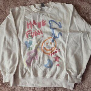 White sweater with abstract design